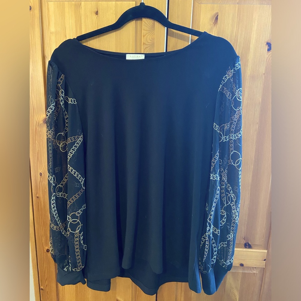 Black with tan detailed sleeve, mesh chain print with cuff.